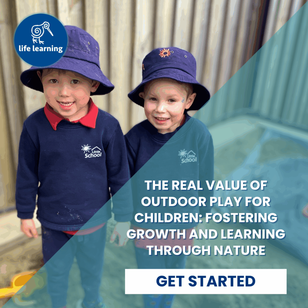 Two smiling children in navy blue uniforms after outdoor play, highlighting the benefits of nature-based learning and social development