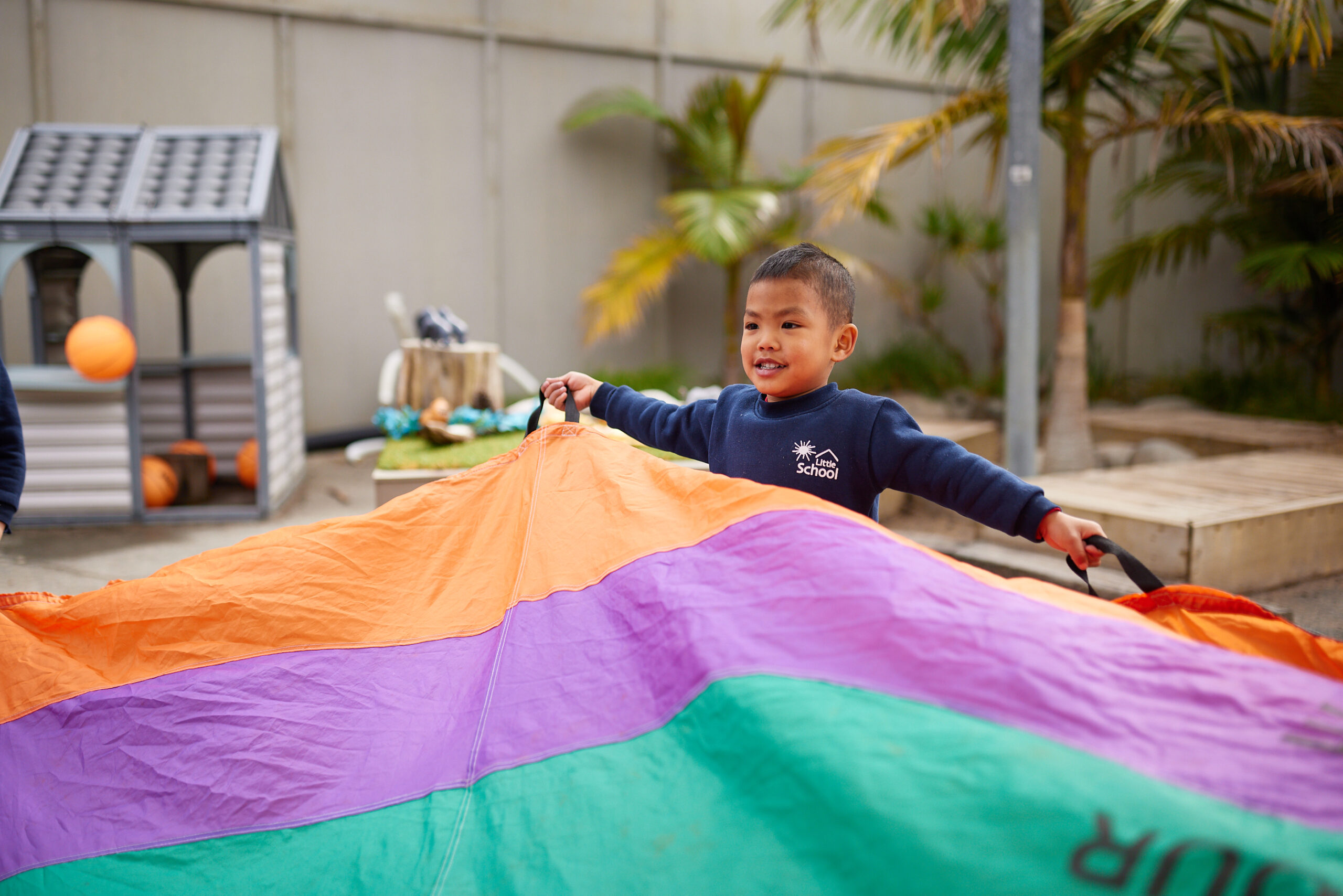 A boy carrying a big thing with happiness and excitement