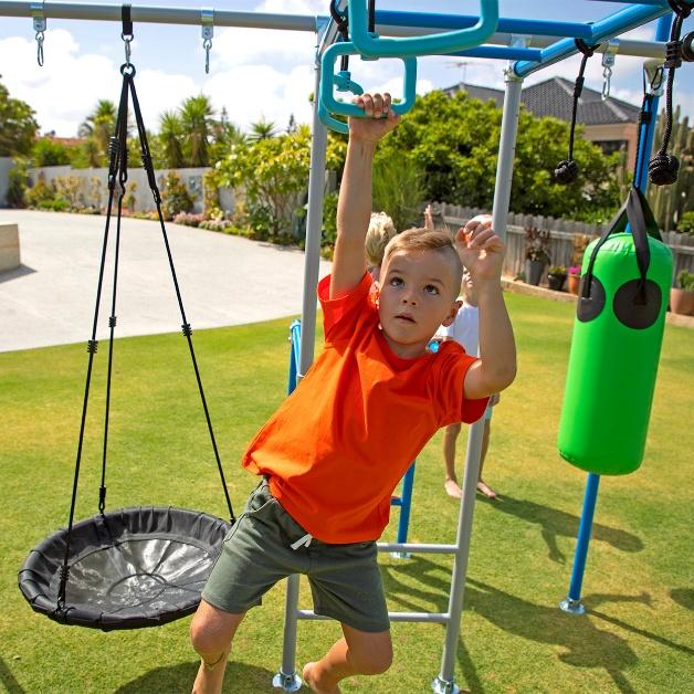 An image of a kid playing in a playground