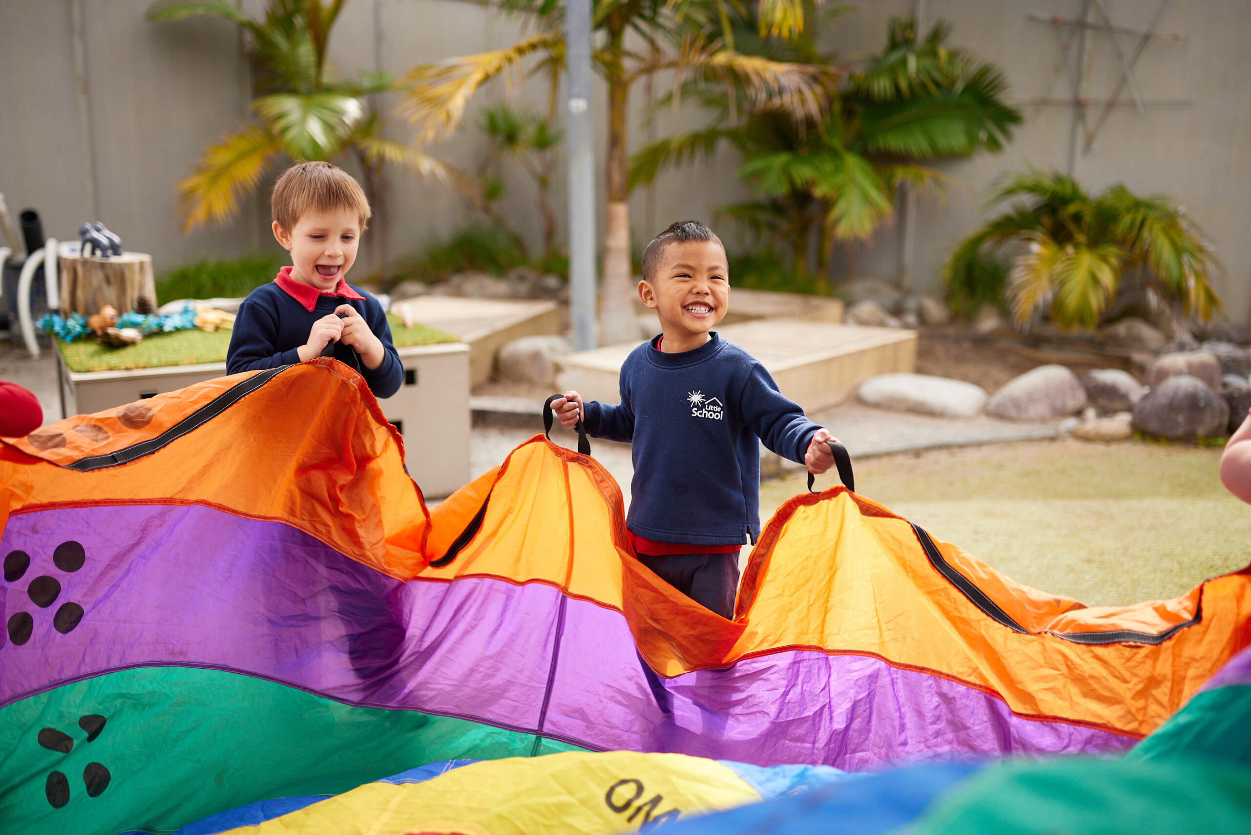 Early childhood education blog: child learning and playing together